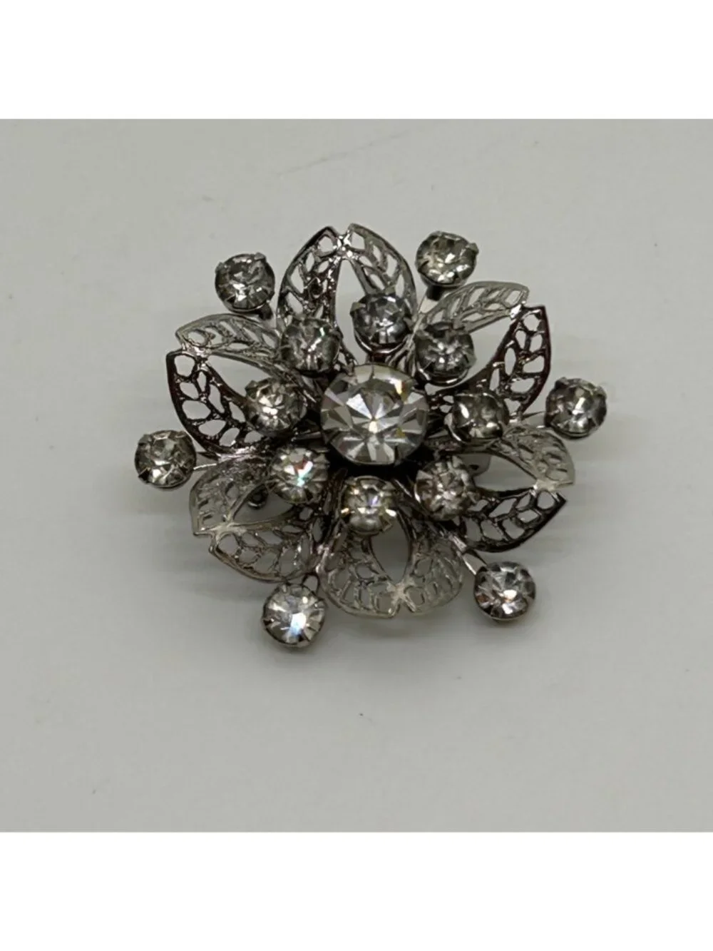 Vintage Silver Tone Rhinestone Brooch Pin Clear Crystal Floral Filigree Mid Cent